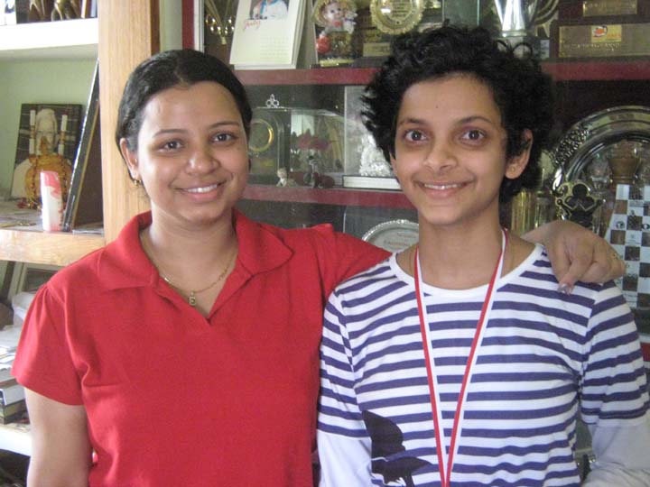 Padmini Rout (R) with her elder sister Emilee at home in Bhubaneswar on August 29, 2010.