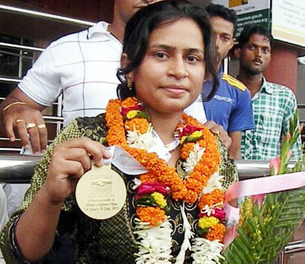 Aparajita Gochhikar with her Commonwealth championship gold medal in Bhubaneswar on July 7, 2011.