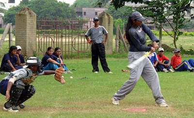 Players work out at the women`s National baseball camp in Cuttack