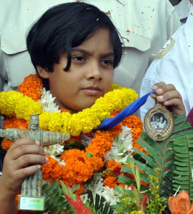 Saina Salonika gets warm reception on her return home after winning a bronze medal in the World Youth Chess Championship in Brazil on Novembe 30, 2011.