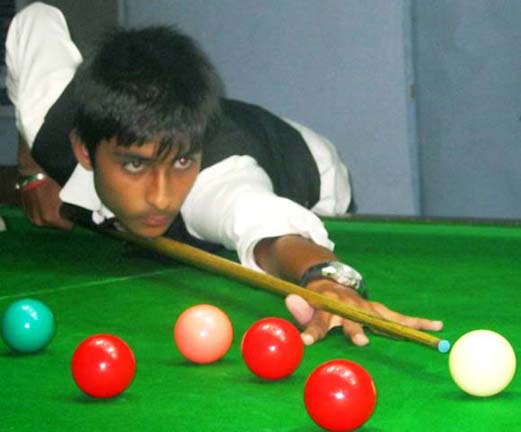 Chirag Arora in action during the junior snooker final in Bhubaneswar on Dec 1, 2011.