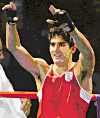 Indian boxer celebrates his victory in Beijing Olympics in August, 2008.