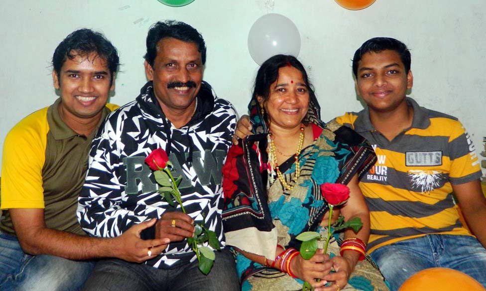 File photo of Odisha sports educationist Dr Manamohan Rout with his wife and two sons.