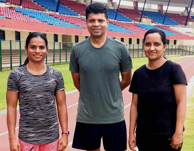 Odisha athletics star Dutee Chand with IAS Officer couple V Karthikeyan Pandian and Sujata Karthikeyan at Kalinga Stadium, Bhubaneswar on 25 June, 2020.