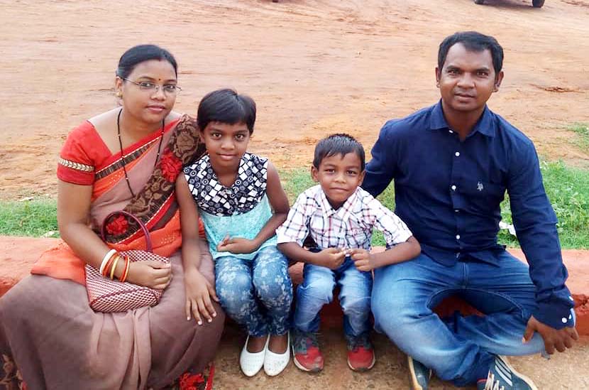 Odisha archery coach Rajesh Hasdak with his wife Menka, daughter Reema and son Tirupati at an unknown place on 25 June, 2017.