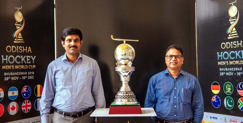 Undated file picture of Odisha Sports Department Secretary Vishal K Dev (Right) and Director R Vineel Krishna with FIH Men`s World Cup trophy in Bhubaneswar in 2018.