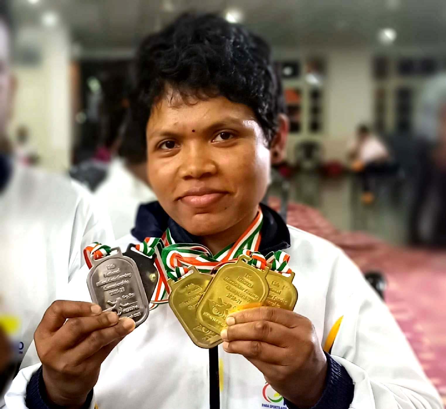 Odisha woman para-fencer Pujaswini Nayak with her medals at the 13th National Wheelchair Fencing Championship in Karnal, Haryana on 28 March, 2021.