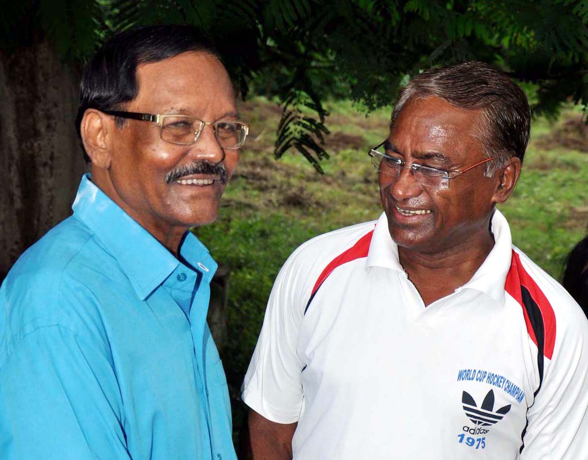 India Hockey Olympians Michael Kindo (Left) and Ashok Kumar at Biju Patnaik Hockey Stadium in Rourkela on 8 August, 2014.