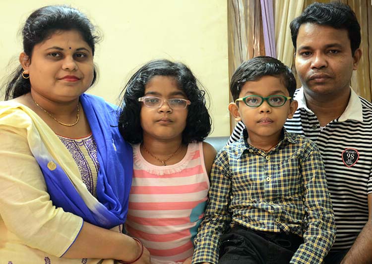 Undated file picture of Odisha chess international Yashita Rout with her parents and brother.