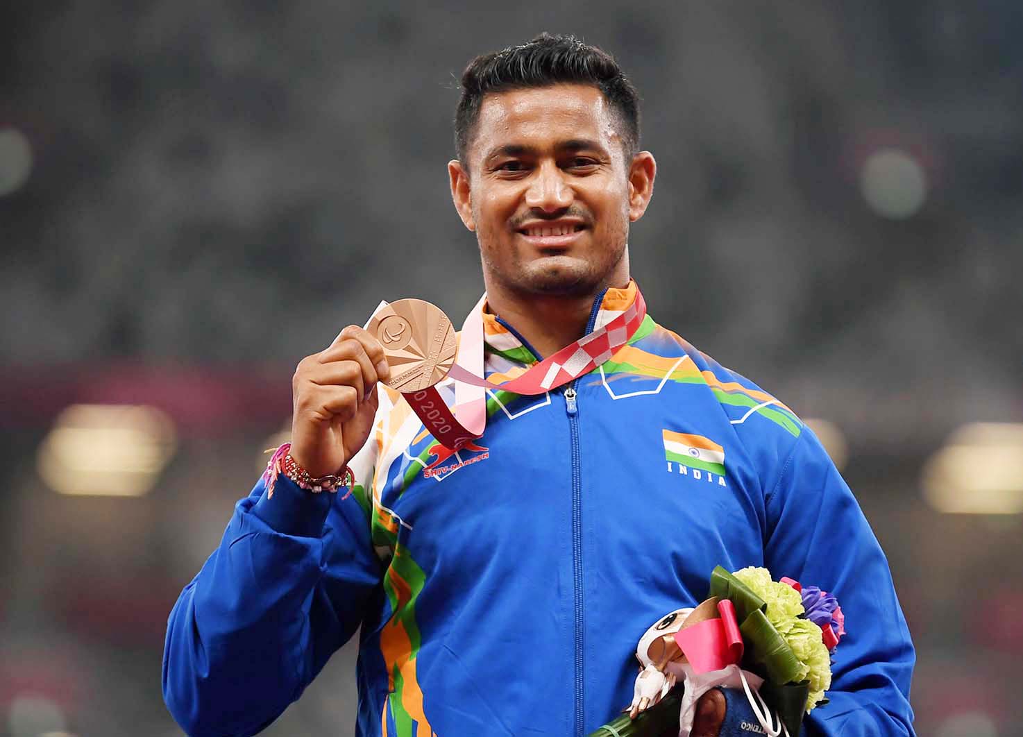 Indian javelin thrower Sundar Singh Gurjar with his bronze medal at the Tokyo Paralympics on 30 August 2021.