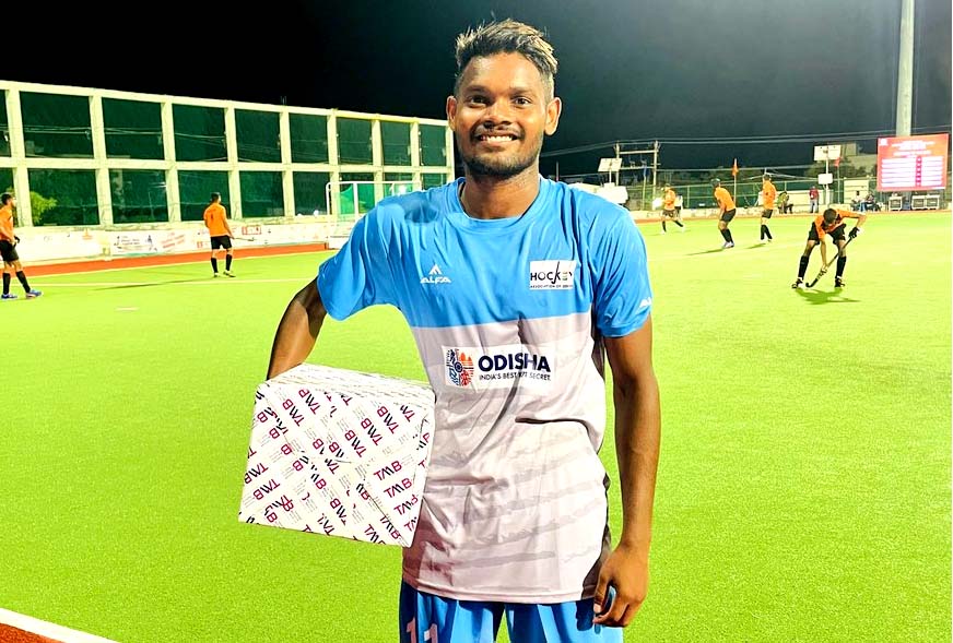 Paulus Lakra of Hockey Association of Odisha poses with his Player of the Match prize after scoring six goals against Puducherry Hockey at the 12th Hockey India Junior Men National Championship in Kovilpatti, Tamil Nadu on 22 May 2022.