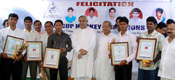 Chief Minister Naveen Patnaik felicitates Orissa`s five hockey internationals at the Kalinga Stadium Swimming Complex in Bhubaneswar in 2008.