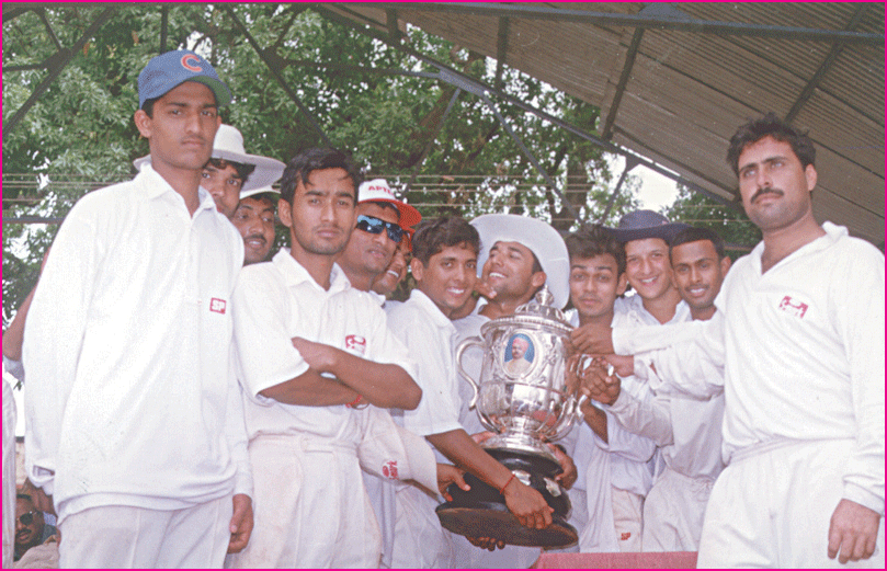 Players of Bhubaneswar lift the Kalahandi Cup after winning the Senior Inter-District Cricket Tournament in Jeypore, Koraput in 1998.