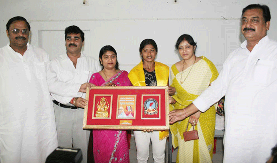 Karateka Valina Valentina (third from left) receives a memento at a felicitation function in Bhubaneswar on October 17, 2008.