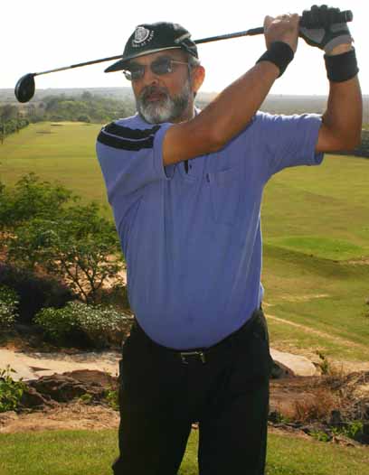 BGC golf captain P K (Bhumi) Mohanty demonstrates a stroke at the club course in Bhubaneswar on Feb 23, 2007.