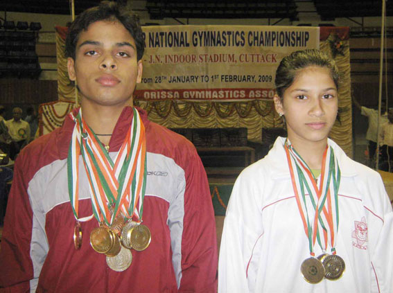 All-around champions Rakesh Kumar Patra (Left) and Rucha Divekar at the 49th Junior National Gymnastics Championship in Cuttack on Feb 1, 2009.