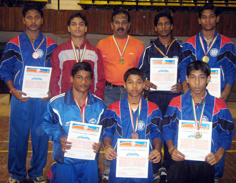 Orissa team pose after winning silver medal in boys` team event of the 49th Junior National Gymnastics Championship in Cuttack on Feb 1, 2009.