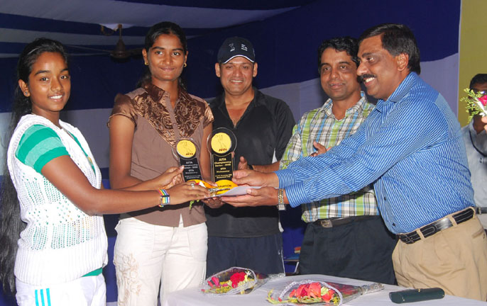 Nikkie Gargi (Orissa) and J Doondi Priya (AP) take the under-16 girls` doubles trophy at the AITA Championship Series Tournament in Bhubaneswar on Nov 5, 2008.
