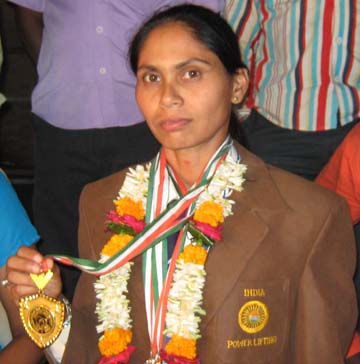 <b>Mandakini Mohanta </b>displays her Asian gold medal in Bhubaneswar on <b>May 3, 2009.