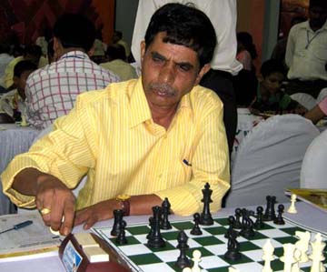 Former Orissa National `B` champion <b>Pabitra Mohan Mohanty</b> plays at the Open GM Chess Tournament in Bhubaneswar on <b>June 10, 2009.