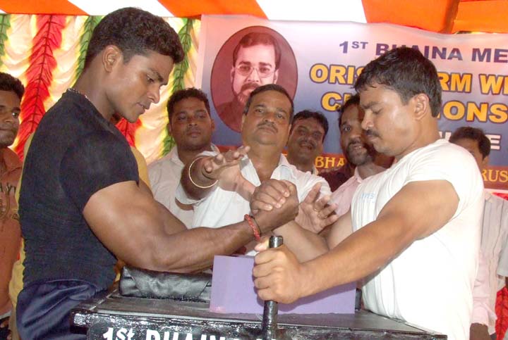 A fight for honour in the first Bhaina Memorial All-Orissa Arm Wrestling Tournament in Bhubaneswar on <b>June 20, 2009.