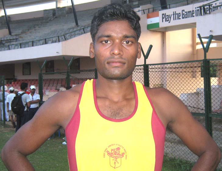Orissa`s <b>Dharmedhar Mahanta </b>poses after equaling the 110m hurdles National record at the East Zone Junior Athletics Championship in Bhubaneswar on <b>August 17, 2009.
