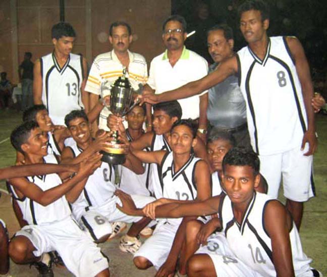 Unit-9 Government High School team with KDBA inter-school basketball trophy in Bhubaneswar on <b>Oct 25, 2009.
