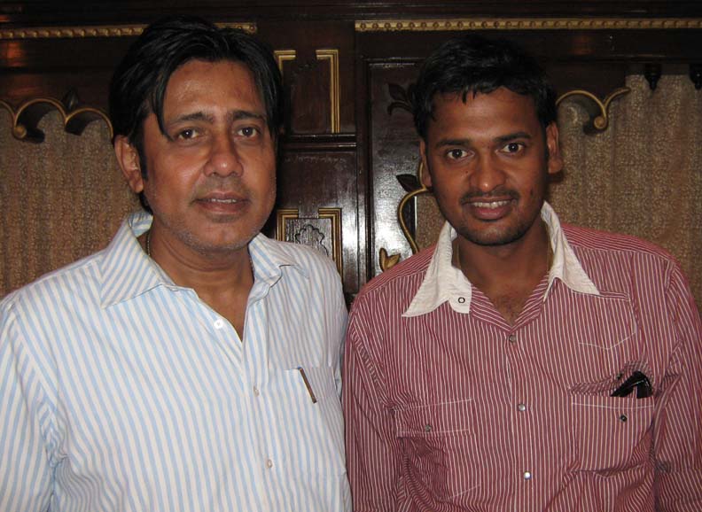 Former Test cricketer Debasis Mohanty (R) with his friend C P Sharma in Bhubaneswar on April 11, 2010.
