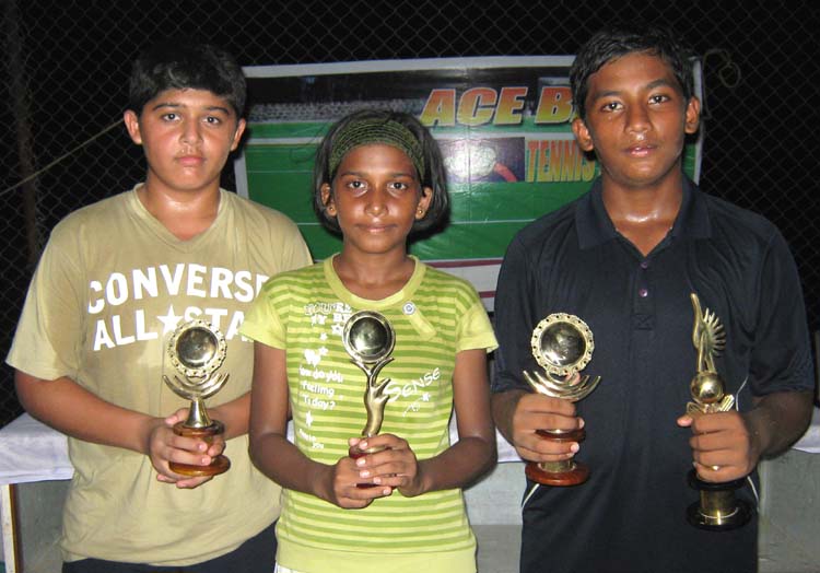 Title winners (left to right) Nishant Thacker, Komal Vishakha and Abhilash Sahoo at the 2nd Ace-Base Tennis Tournament in Bhubaneswar on June 6, 2010.