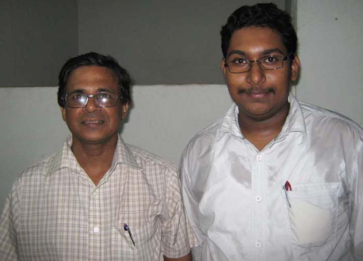 Former Orissa State Chess Association secretary Gagan Behari Dash (L) with his son Sanket Sagar Dash in Bhubaneswar on June 16, 2010.
