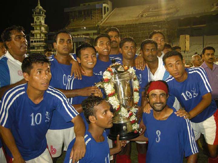 Players of Army XI celebrate afer winning the Kalinga Cup All-India Football Tournament in Cuttack on July 10, 2010..