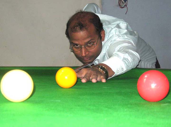 Debasish Mohanty plays his quarterfinal match in the State Senior Billiards Championship in Bhubaneswar on July 6, 2010.