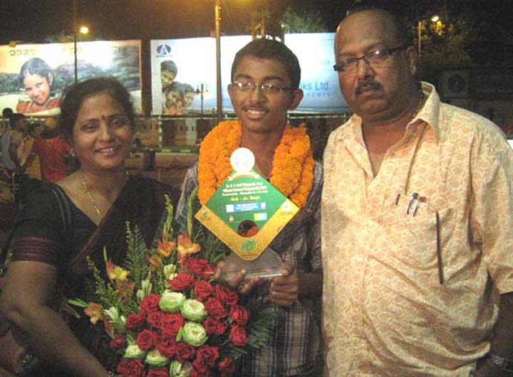 Ashutosh Padhy with his parents at the airport in Bhubaneswar on August 30, 2010.
