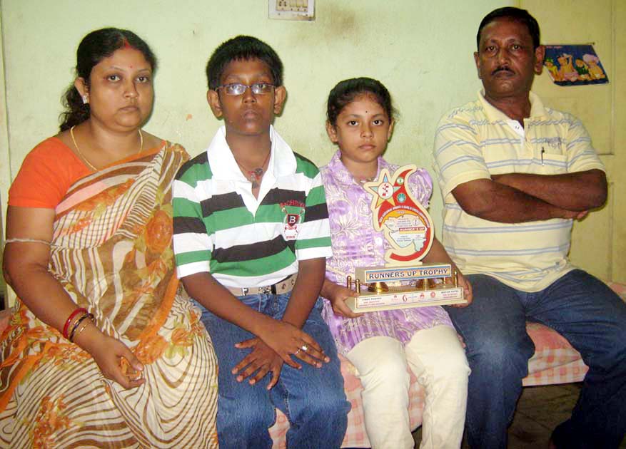 Rutumbara Bidhar with her parents and brother in Bhubaneswar on Oct 18, 2010.
