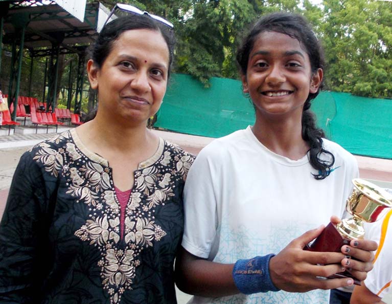 Odisha tennis players Kalaga Bhargavi with her mother Nivedita Nanda at Kalinga Stadium in Bhubaneswar on May 19, 2014.