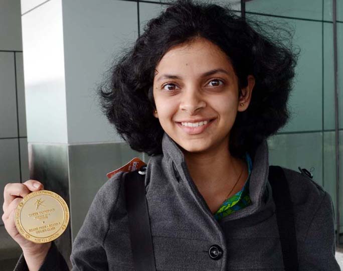 Odisha WGM Padmini Rout shows her Olympiad gold medal in Bhubaneswar on August 17, 2014.
