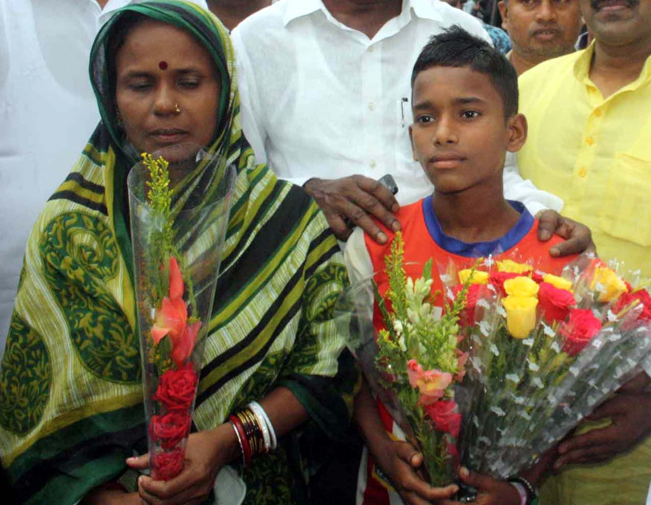 Football pridigy Chandan Nayak with his mother in Bhubaneswar on August 5, 2016.