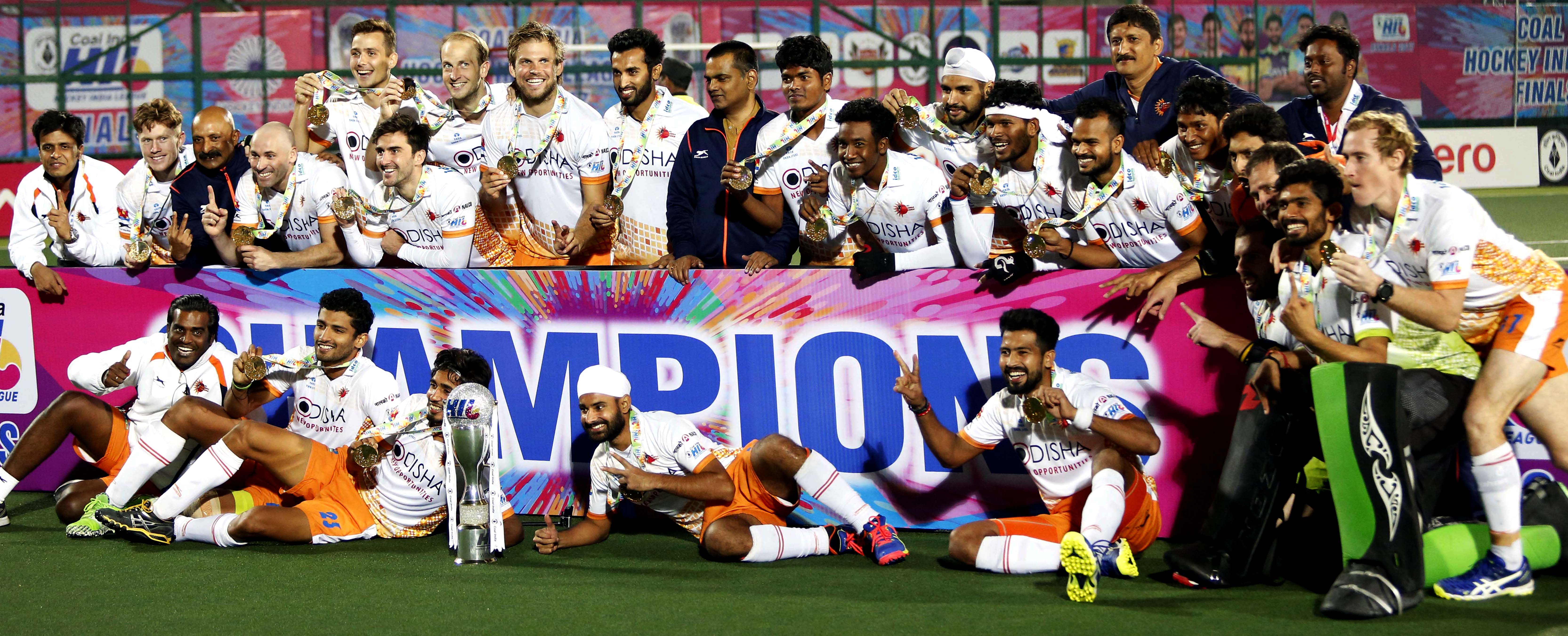 Members of Kalinga Lancers celebrate their title triumph in Hockey India League at Chandigarh on Feb 26, 2017.