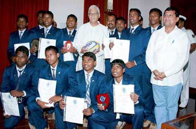 Governor M C Bhandare felicitates the KISS rugby team in Bhubaneswar on 26th August 2008