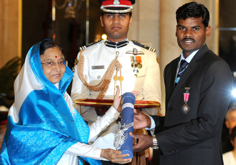 Odisha hockey star Ignace Tirkey receives Padma Shri Award from President Prativa Patil at New Delhi in 2010.