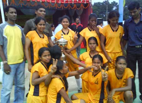 Khurda girls with the State youth basketball trophy in Rourkela on August 31, 2008