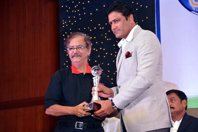 Undated photo of Orissa cricketer Santanu Satpathy receiving an award from former India captain Anil Kumble.
