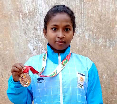 Odisha kho-kho international Mandakini Majhi poses with her South Asian Games gold medal on 5 November, 2020.