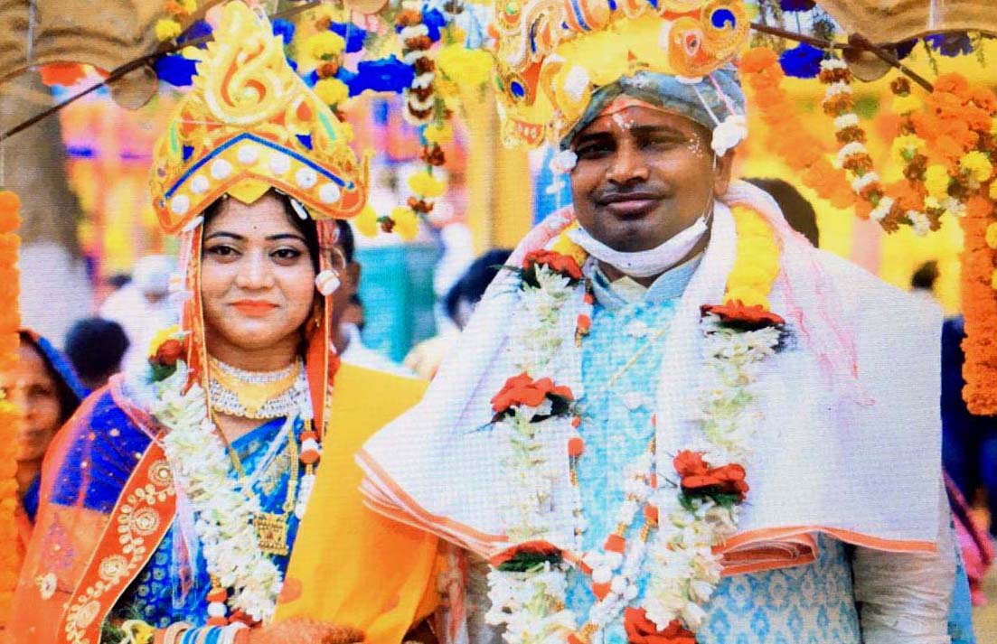 Odisha Sports Minister Tusharkanti Behera with his wife Nandini at their wedding ceremony in Kakatpur on 25 February, 2021.