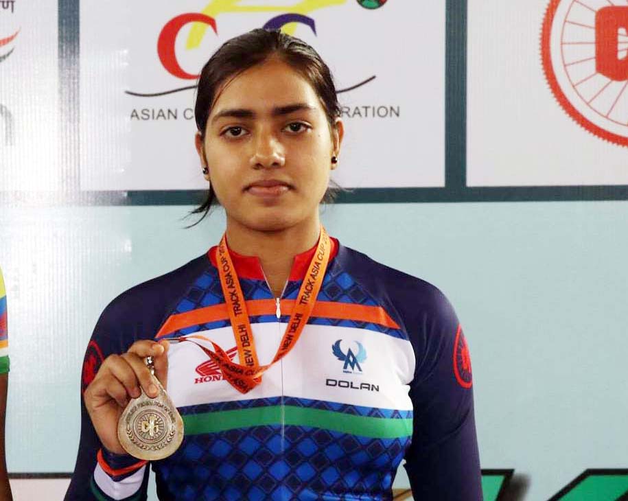 Odisha woman cyclist Swasti Singh with her gold medal at the Track Asia Cup in New Delhi, 2018.