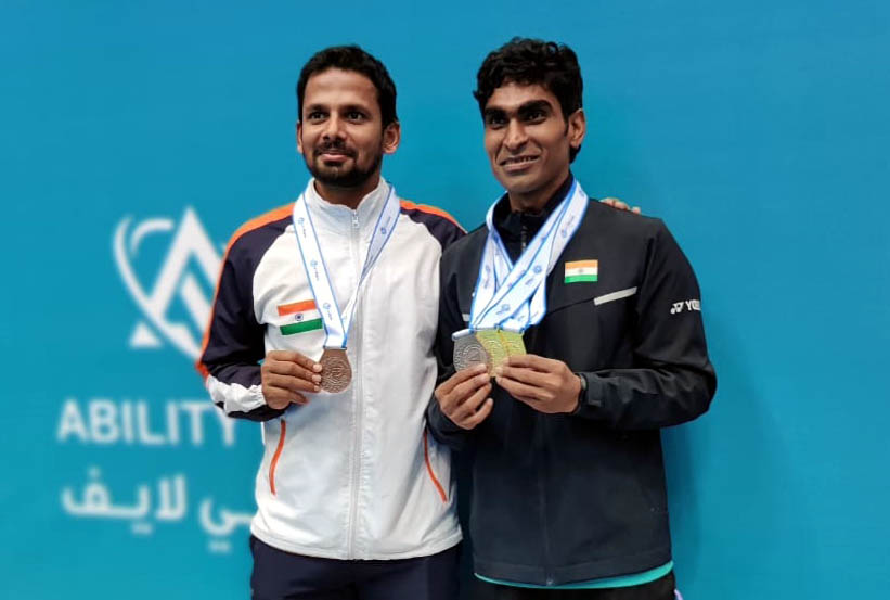 Odisha para-shuttlers Deep Ranjan Bisoyee (Left) and Pramod Bhagat with their medals at the Dubai Para Badminton International in Dubai on 4 April, 2021.