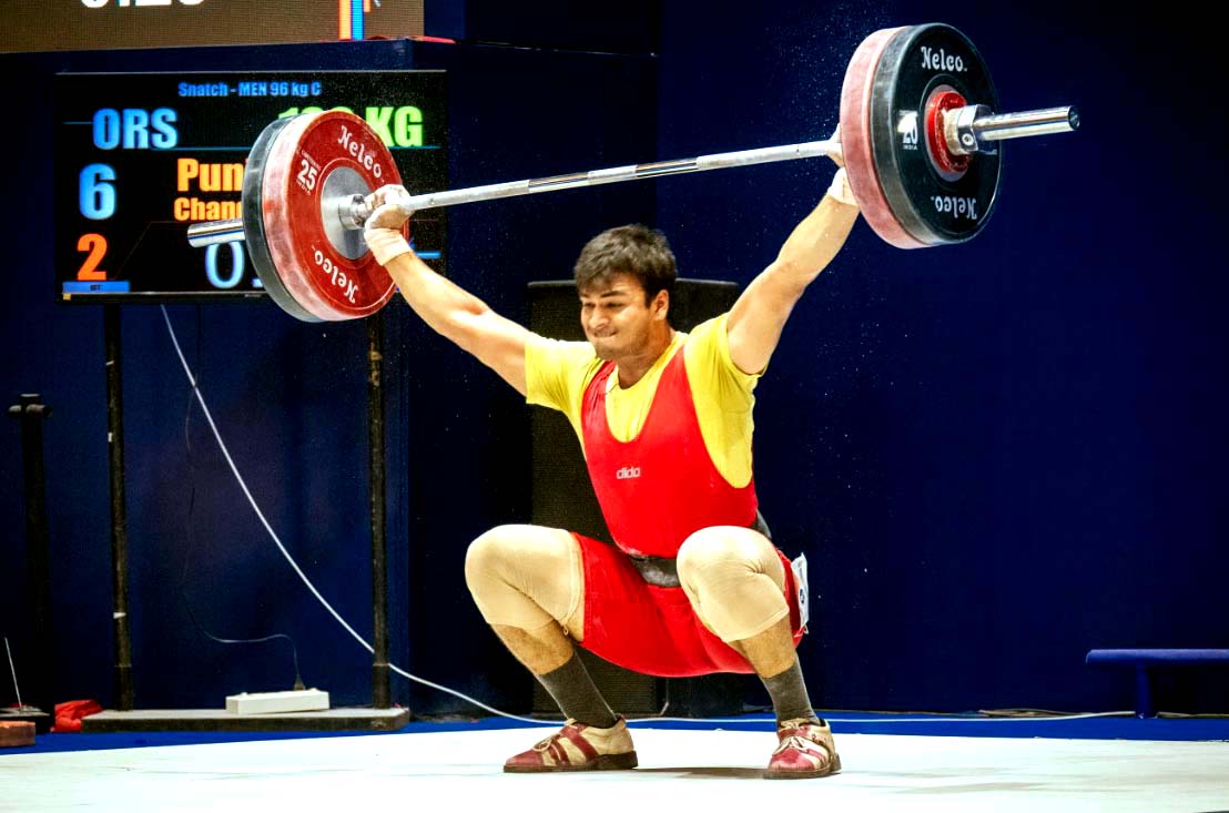 Odisha lifter Punit Chandra Sahu in action at the National Weightlifting Championship in Bhubaneswar on 28 March 2022.