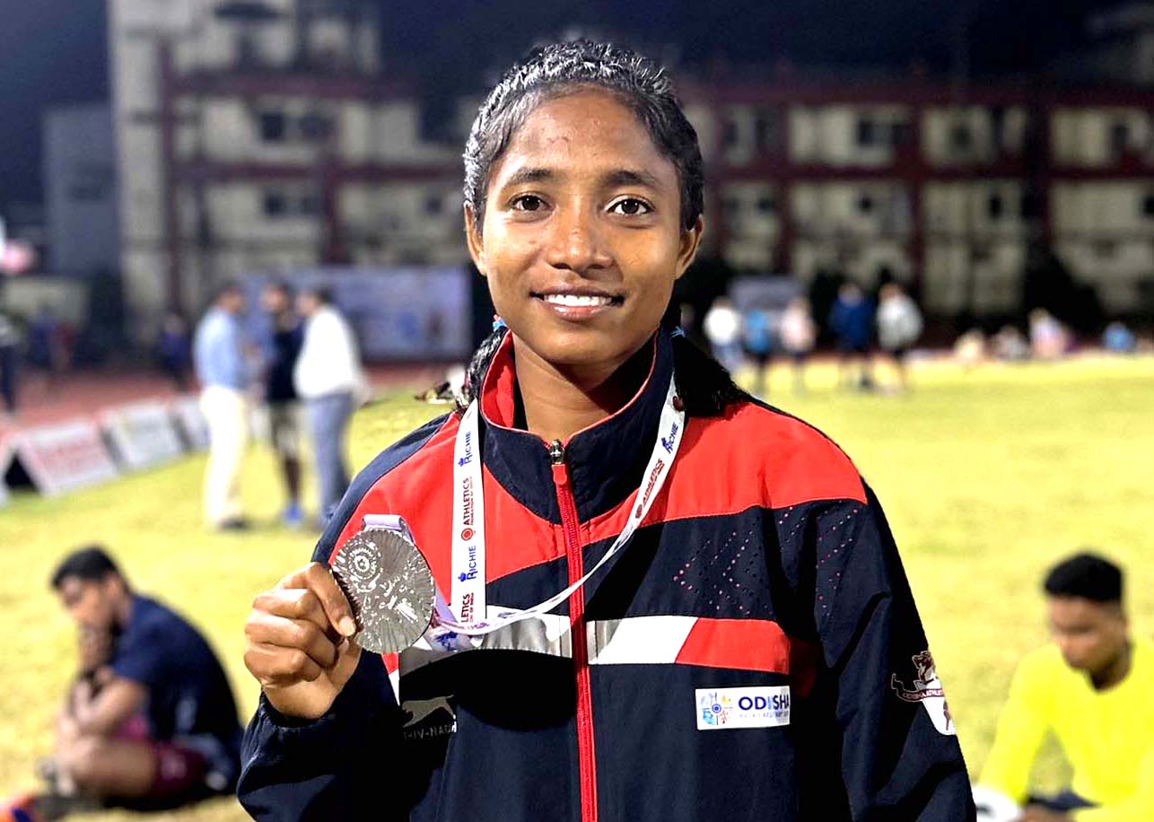 Odisha athlete Merymukta Soreng poses with her U-20 women triple jump silver medal at the 37th National Junior Athletics Championships in Guwahati, Assam on 14 November 2022.