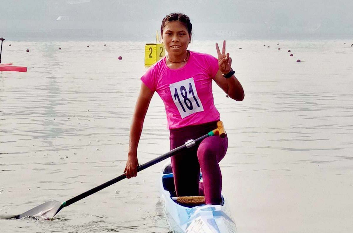 Leichongbam Neha Devi celebrates after winning a medal for Odisha at the 36th National Games in Ahmedabad on 10 October 2022.