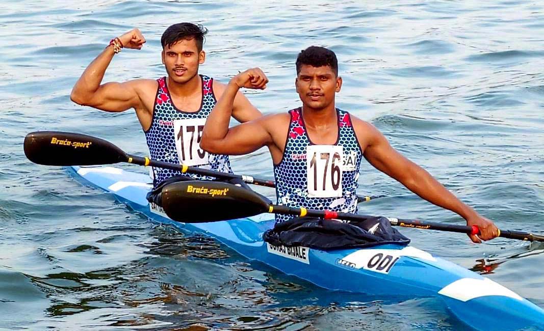 Suraj Bijale (Front) and Satyam Baliyan celebrate after winning bronbze medal for Odisha at the 36th National Games in Ahmedabad on 9 October 2022.